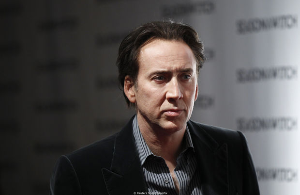 Actor Nicholas Cage arrives for the premiere of the film "Season of the Witch" in New York